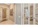Hallway showing entry into an office featuring french glass doors at 551 Ranger Ln, Longboat Key, FL 34228