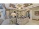 Stylish living room showcasing elegant décor, a fireplace, and access to the home's entrance at 551 Ranger Ln, Longboat Key, FL 34228