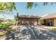 Attached garage with ample driveway space at 5604 Doral Dr, Sarasota, FL 34243