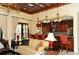 Beautiful clubhouse interior with elegant furnishings, lighting and a bar with seating at 5723 Title Row Dr, Bradenton, FL 34210