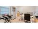 Bright office space featuring a keyboard, shelves, and computer setup at 5723 Title Row Dr, Bradenton, FL 34210