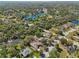 Overhead shot capturing tranquil lakes surrounded by verdant foliage, enhancing the appeal of this home's idyllic setting at 610 147Th St E, Bradenton, FL 34212