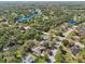 A lovely neighborhood with lakes, trees, and homes with pools at 610 147Th St E, Bradenton, FL 34212