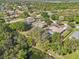 Charming home featuring a pool, nestled in a lush neighborhood with winding streets and a serene, peaceful setting at 610 147Th St E, Bradenton, FL 34212
