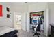 Bedroom featuring a closet with a computer desk and an ensuite bathroom at 610 147Th St E, Bradenton, FL 34212