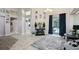 Living room showcasing tile flooring and seamless access to the outdoor space at 610 147Th St E, Bradenton, FL 34212