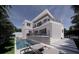 Luxury home showcasing a backyard pool, patio, and balcony with modern design at 610 Hibiscus Way, Longboat Key, FL 34228