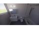 Modern bathroom features a tub and shower combination, along with a sleek vanity and mirror at 610 Hibiscus Way, Longboat Key, FL 34228