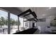 Stunning dining room featuring modern light fixtures and an adjacent outdoor lounge space at 610 Hibiscus Way, Longboat Key, FL 34228