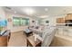 Spacious living room with large windows, lots of light, and an open floor plan at 6138 100Th E Ave, Parrish, FL 34219