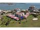 An aerial view of a waterfront condo complex, a golf course, and intercoastal waterway at 6269 Palma Del Mar S Blvd # 308, St Petersburg, FL 33715
