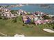 Stunning aerial view of the property on the golf course with beautiful water views and lush landscaping at 6269 Palma Del Mar S Blvd # 308, St Petersburg, FL 33715