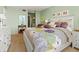 Comfortable bedroom with a queen-size bed, soft lighting, and ample dresser space at 6269 Palma Del Mar S Blvd # 308, St Petersburg, FL 33715