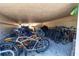 Covered bike storage area filled with various bicycles for community use at 6269 Palma Del Mar S Blvd # 308, St Petersburg, FL 33715