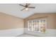 This bedroom features a neutral color palette, and a large window for natural light at 6412 Rosefinch Ct # 102, Lakewood Ranch, FL 34202