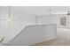 Second story hallway featuring carpet flooring and natural lighting at 6412 Rosefinch Ct # 102, Lakewood Ranch, FL 34202