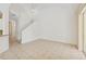 A bright living room offers an open floor plan, neutral tile, and a blank canvas for new owners at 6412 Rosefinch Ct # 102, Lakewood Ranch, FL 34202