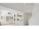 Spacious living area offering a view of the kitchen and staircase at 6412 Rosefinch Ct # 102, Lakewood Ranch, FL 34202