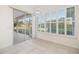Dining room featuring big windows that look out to the screened in lanai at 664 Silk Oak Dr, Venice, FL 34293