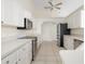 White kitchen with modern appliances and ample counter space for cooking at 664 Silk Oak Dr, Venice, FL 34293