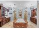 A luxurious bathroom with a large tub, custom tilework, and dual vanities at 6822 Dominion Ln, Lakewood Ranch, FL 34202