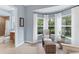 A cozy sitting area with bay windows adjacent to the Primary bath at 6822 Dominion Ln, Lakewood Ranch, FL 34202