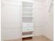 Well-organized closet with adjustable shelving and drawers, maximizing storage space at 711 Planters Manor Way, Bradenton, FL 34212