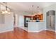 Bright and airy living room adjoins the kitchen and has convenient access to other rooms at 711 Planters Manor Way, Bradenton, FL 34212