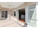 Covered patio providing entry to the kitchen and living areas, and overlooks the pool at 711 Planters Manor Way, Bradenton, FL 34212