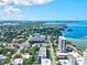 Enjoy breathtaking water views and a serene atmosphere in this aerial view of the waterfront area at 755 S Palm Avenue # 604, Sarasota, FL 34236