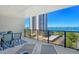Spacious balcony with seating offers panoramic views of the city and waterfront at 755 S Palm Avenue # 604, Sarasota, FL 34236