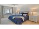 Calm main bedroom with a cozy window seat and elegant furnishings at 755 S Palm Avenue # 604, Sarasota, FL 34236