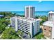 Exterior of a large residential building with scenic waterfront views at 755 S Palm Avenue # 604, Sarasota, FL 34236