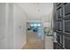 Inviting entryway with tiled floor offering seamless transition to the spacious living area and water view at 755 S Palm Avenue # 604, Sarasota, FL 34236