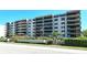 Multi-story condo building featuring private balconies with sleek, modern black railings at 755 S Palm Avenue # 604, Sarasota, FL 34236