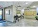 Light and airy lobby features seating, mailboxes, and sleek tile flooring at 755 S Palm Avenue # 604, Sarasota, FL 34236