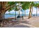 Scenic view of waterfront featuring a swing with water views at 755 S Palm Avenue # 604, Sarasota, FL 34236