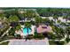 Aerial view showcasing the community pool, clubhouse and recreation area at 7783 Limestone Ln # 10-101, Sarasota, FL 34233