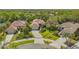 Charming home with a well-manicured lawn and inviting driveway, perfect for a Gathering at 7847 Chick Evans Pl, Sarasota, FL 34240