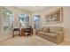 Bright office space with multiple windows and neutral carpeting and decor at 7847 Chick Evans Pl, Sarasota, FL 34240