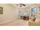 Bright office space with multiple windows and neutral carpeting and decor at 7847 Chick Evans Pl, Sarasota, FL 34240
