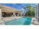 Enclosed pool area with patio and comfortable seating, perfect for relaxation at 7847 Chick Evans Pl, Sarasota, FL 34240
