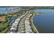 Aerial view of community with lakefront property at 8016 Grande Shores Dr, Sarasota, FL 34240