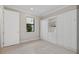Bright room with tiled floor, built in wardrobes, and lots of storage at 8016 Grande Shores Dr, Sarasota, FL 34240