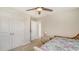 Relaxing bedroom with a closet and inviting bed, providing a comfortable and private space for rest and relaxation at 8918 Waxwing Way, Parrish, FL 34219