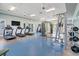 Fully equipped gym with treadmills, weights, and strength training machines at 10165 Canaveral Cir, Sarasota, FL 34241