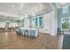 Spacious kitchen with modern appliances, a large center island with seating, and a view of the outdoors at 10165 Canaveral Cir, Sarasota, FL 34241