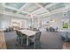 Comfortable lounge area with stylish seating, tables, and plenty of natural light at 10165 Canaveral Cir, Sarasota, FL 34241