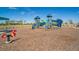 Bright and colorful playground with climbing structures, slides, and soft landing surfaces for safe play at 10165 Canaveral Cir, Sarasota, FL 34241