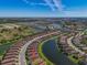 Stunning aerial view of a Primary-planned community featuring waterfront homes and lush landscaping in a desirable location at 10230 Highland Park Pl, Palmetto, FL 34221